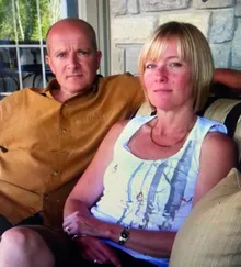 Two of the parents who donated the computers for Bob's classroom lab